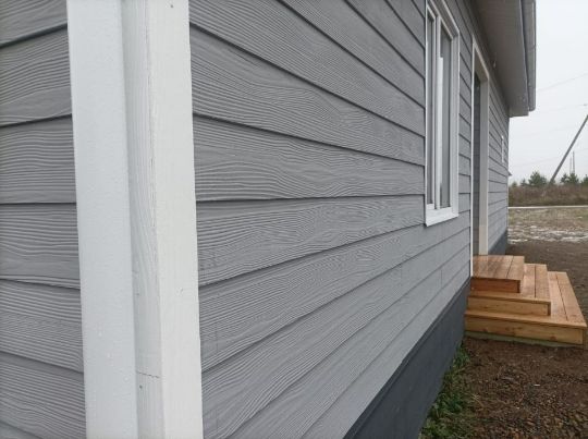 дом с черепицей Тимлит